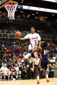 Virginia Union’s Ray Anderson (#3) takes it to the hoop against Virginia State’s Amiel Terry (#24)