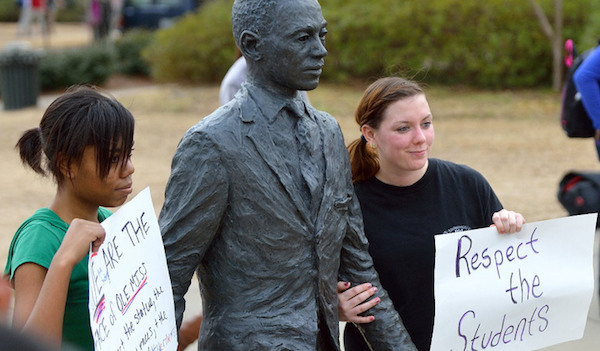 Students gather at the James Meredith statue to support diversity and inclusion in response to recent vandalism at the monument.